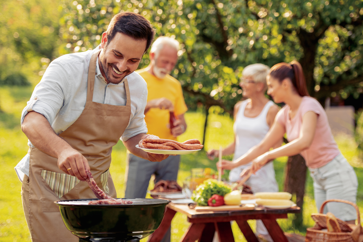 Family having a barbecue party in their garden